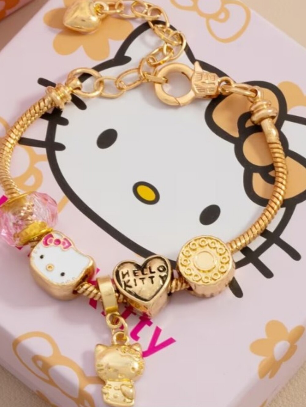 Hello Kitty Gold-tone Charm Bracelet Mystery Box. Bracelet Included.